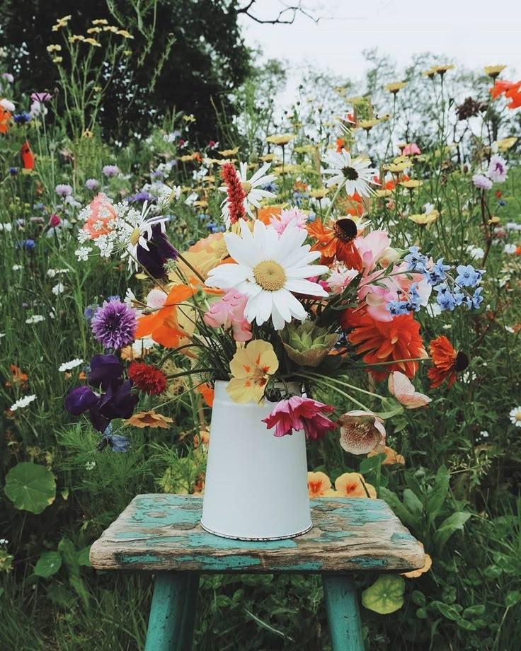 Open Field Collective workshop space where corporate flower arrangements are designed and prepared for business delivery